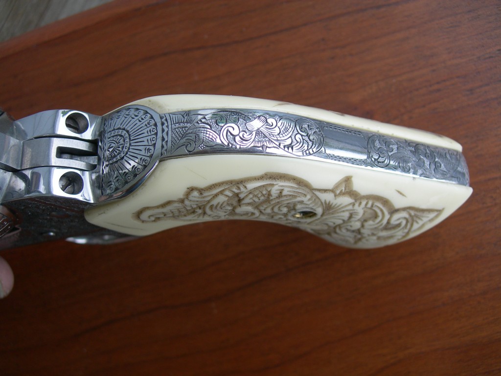 Ivorex grips and American Scroll engraving
