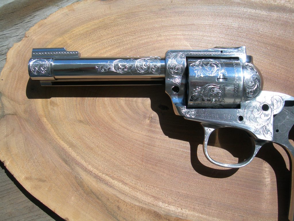 Custom JRH 10mm revolver in 50%+ American Scroll-style engraving coverage.