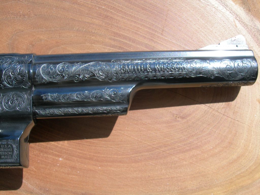 Details on the barrel of a Smith & Wesson Model 57 featuring intricate American Scrollwork.