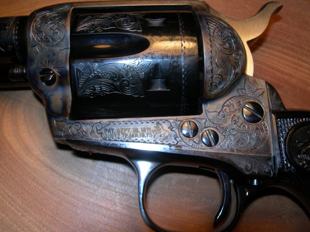 Colt Single Action Army in just over 50% engraving coverage.