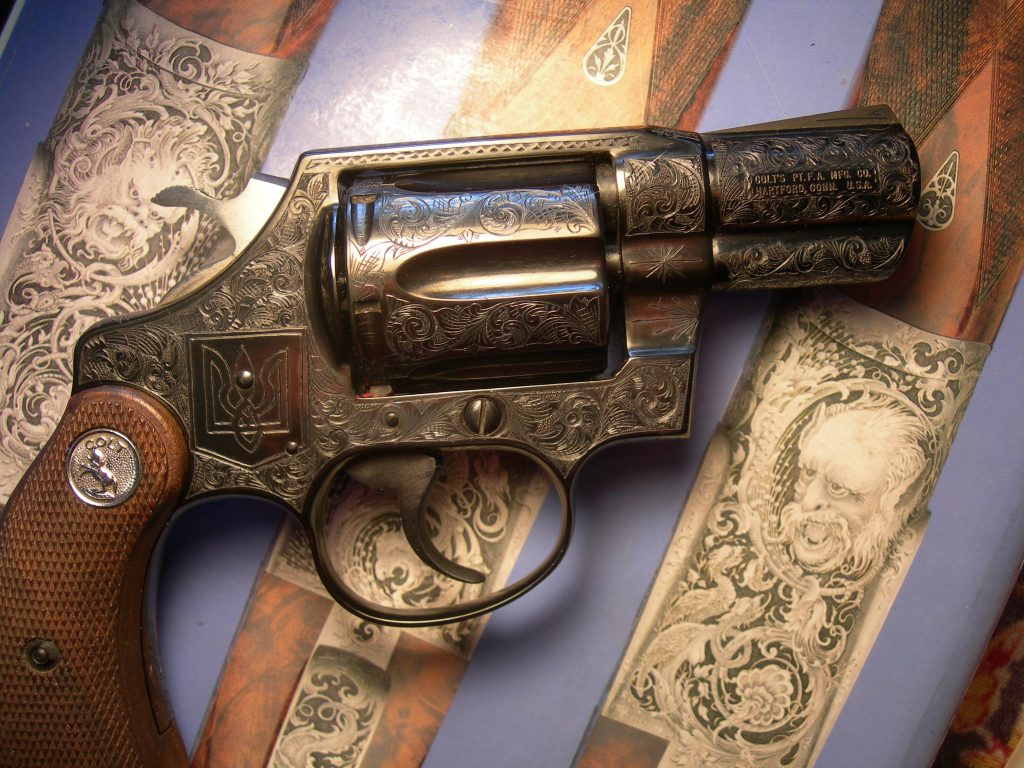 Colt Detective fully engraved in American Scroll with the symbol for Ukraine engraved upon the side.