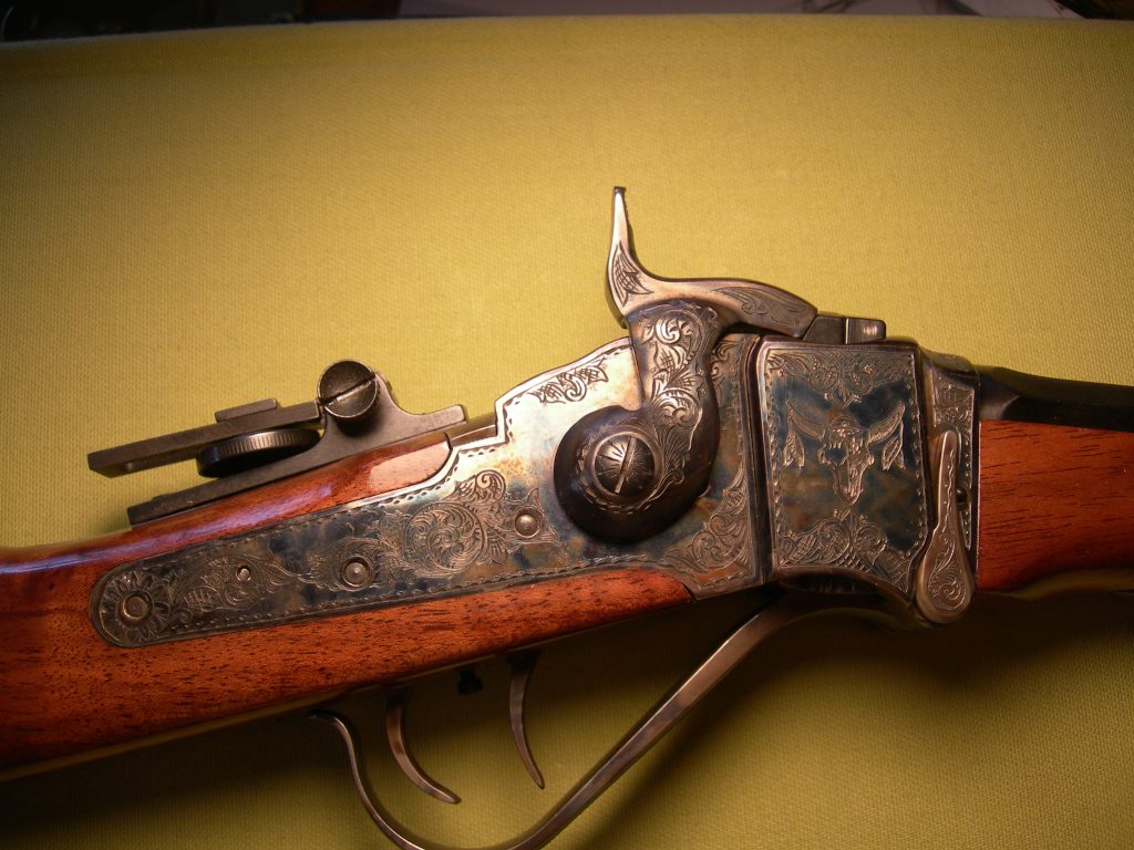 The photo shows the lock-side with a Sundance buffalo skull.